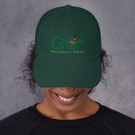 Green "Go Experience Nature" cap on model.