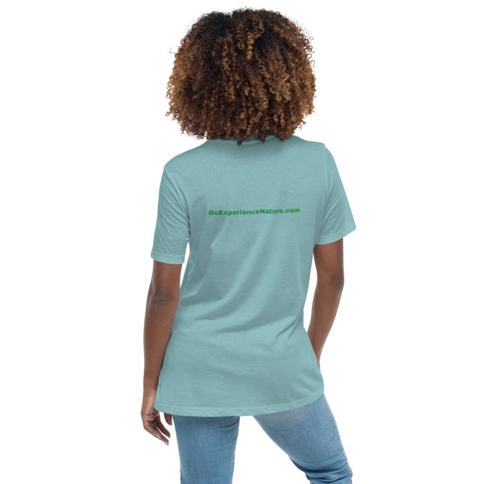 Woman wearing a blue t-shirt with logo.