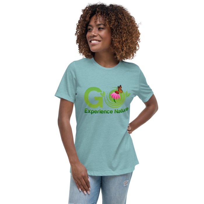 Woman wearing a blue "Go Experience Nature" shirt.