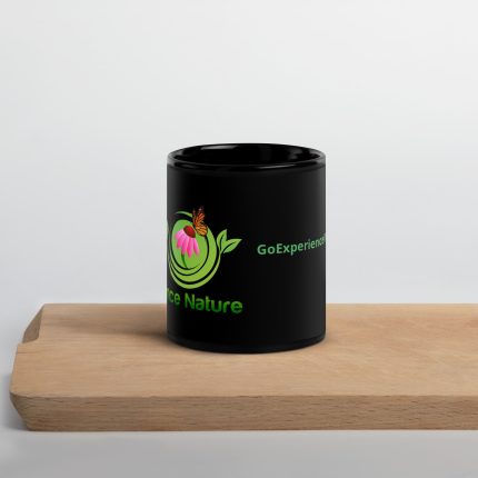 Black mug with flower and butterfly design.