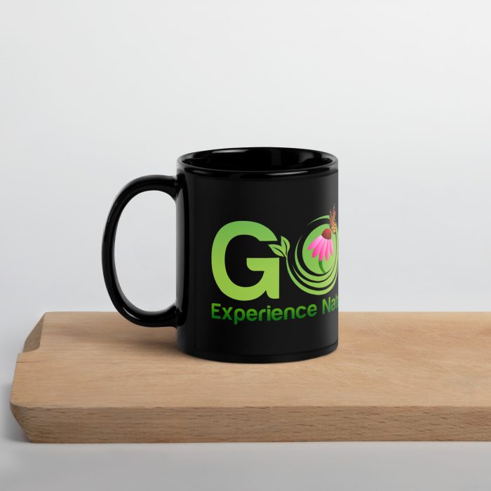 Black mug with green "Go" logo.