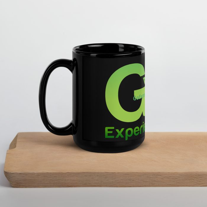 Black mug with green "Go Experience" logo.