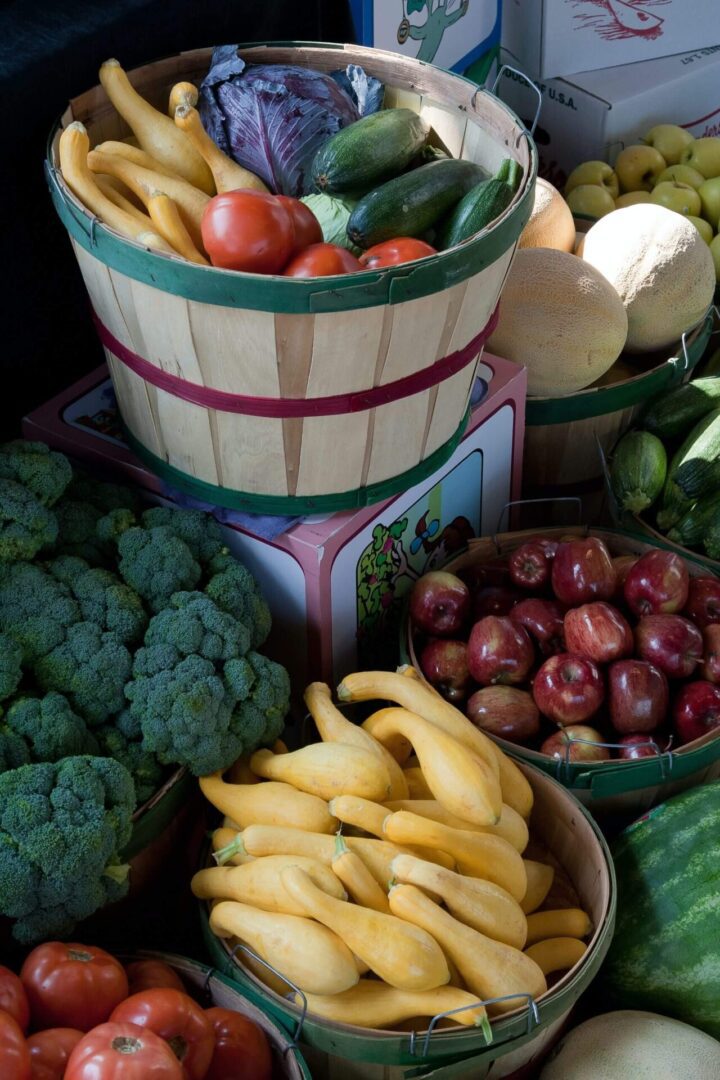 Basket full of fresh produce and fruit.